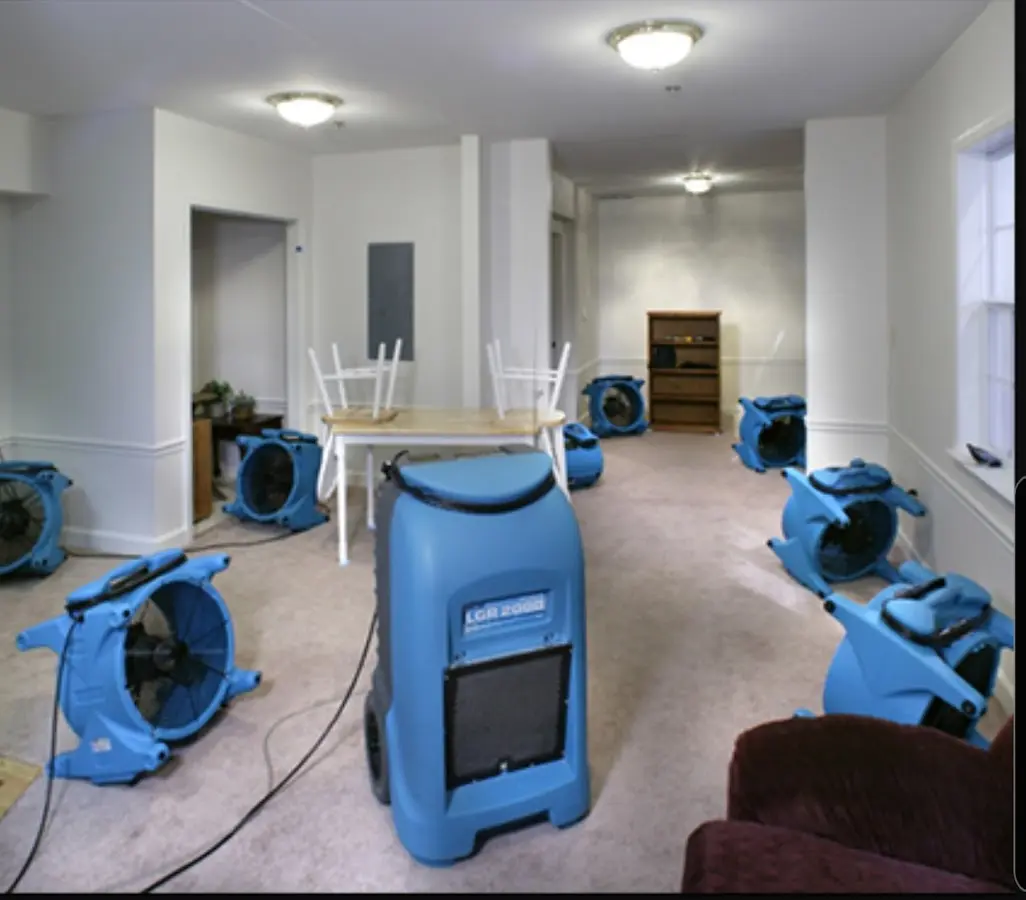 Air movers and dehumidifier setup for Water Extraction & Removal in Girard